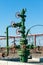 Petroleum well wellhead equipment. Hand valve with handwheel on the flow line. Oilfield site. Oil, gas industry concept