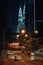 Petronas building in the night with road and running cars in Kuala Lumpur, Malaysia