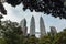 Petronas twin towers with leaves frame in Kuala Lumpur, Malaysia