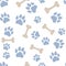 Pets paw pattern. Bones and animal footsteps seamless texture.