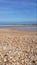 Pett level beach in England, UK. Stone beach in Britain.