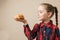 Petty Little Girl eating burger, following fastfood - Image