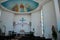 Pews pulpit statues and Jesus ceiling art Catholic Church of Holy Spirit Batumi Georgia