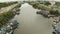 Phan Thiet fishing village. Aerial view of river with colourful Vietnam traditional fishing boats