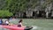 Phang Nga, Thailand - June 1, 2018 : An unidentified tourists kayaking among limestone islands. Kayaking is a popular amusement fo