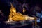 PHANG NGA, THAILAND,Wat Tham Suwan Khuha cave. Golden statue of Buddha of Nirvana in buddhist cave temple in Wat Tham Suwankhuha