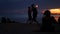 PHANGAN, THAILAND - 23 MARCH 2019 Zen Beach. Silhouettes of performers on beach during sunset. Silhouettes of young