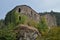 Phantasmagoric Abandoned Building Of Medieval Style Next To The River Suarna In Navia De Suarna. Nature, Architecture, History,