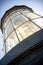 Phare de Chassiron.Top of the lighthouse with signal lens. Island D`Oleron in the French Charente with striped lighthouse. France.