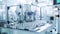 Pharmaceutical manufacturing machine. Automated industrial equipment at pharmaceutical factory. Pharmacy industry equipment.