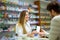 Pharmacist and Client in a Drugstore