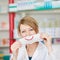 Pharmacist with mask smiling