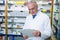 Pharmacist reading a prescription