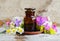 Pharmacy bottle and various wild flowers. Herbal tincture essential oil, infusion, extract, syrup, compound.