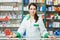 Pharmacy chemist woman in drugstore