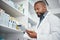 Pharmacy, medicine and black man with tablet to check inventory, stock and medication for online prescription