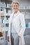 Pharmacy portrait, pharmacist and smile of woman in drugstore or medicine shop. Healthcare, doctor wellness and happy