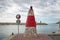 Pharos lighthouse in Benalmadena marina of Malaga, cloudy sky