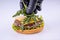 Phased assembly of a hamburger on a light background7