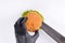 Phased assembly of a hamburger on a white background28