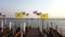 Phayao, Thailand - 2019-03-08 - Many Thailand and Buddhist Flags Flying on Pier
