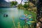 Phewa Lake with multicoloured boats in the valley of Pokhara in central Nepal