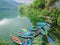 Phewa Lake in Pokhara city with boats in-shore, Nepal