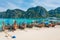 Phi Phi Island, Krabi, Thailand On 16 June 2022 Long tail boat parking on the beach on a sunny day