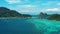 Phi Phi Islands, Thailand, Drone footage, Next to the Maya Bay, Plenty of boats, yachts, beautiful weather, visible mountains,