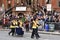 Philadelphia city trash collectors patrol Broad Street in by the crowd in front of the union league during the New Years Day