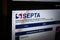 PHILADELPHIA, PENNSYLVANIA - APRIL 25 2023: Selective blur on SEPTA logo on screen of its website for schedules. Southern