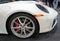 Philadelphia, Pennsylvania, U.S.A - February 9, 2020 - The side view and sports wheel of a 2020 Porsche 911 Carrera 4S in white