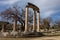 Philippeion in the Altis of Olympia in an open-air museum in Ancient Olympia, Greece in late afternoon