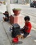 Philippine Poverty: Beggars Waiting on Road Path in Davao City in Mindanao Island, Philippines