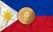 Philippines flag  ethereum gold coin on flag background. The concept of blockchain  bitcoin  currency decentralization in the