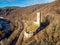 Philippsburg castle ruins with castle tower near Monreal in sunshine and a blue sky