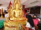 PHITSANULOK, THAILAND - OCT 31, 2018 : Buddhists make merit ,Gilding gold leaf to Buddha for worship. ,Buddhist culture for happy