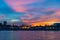Phnom Penh skyline at sunset capital city of Cambodia kingdom, panorama silhouette view  from Mekong river, travel destination,