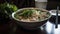 Pho Bo - Vietnamese fresh rice noodle soup with beef, herbs and chili