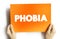 Phobia text quote on card, medical concept background