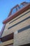 Phoenix, Arizona- Mid-rise building with stone wall cladding and wall vents