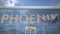 PHOENIX city name and landing airplane at airport terminal. 3d rendering