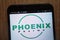 Phoenix Pharma logo displayed on a modern smartphone