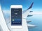 Phone with app mobile wallet and plane ticket airplane wing