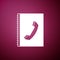 Phone book icon isolated on purple background. Address book. Telephone directory