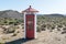 Phone booth name board at the bottom of Ouberg Pass