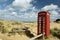 Phone box on beach at Studland Bay near Swanage in Dorset