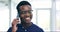 Phone call, smile and black man in business, communication and conversation in startup office. Smartphone, happy and