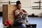Phone, fitness and app with a black woman boxer tracking her workout, exercise and progress with a mobile application in