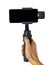 Phone gimbal stabilizer in hand isolated on white